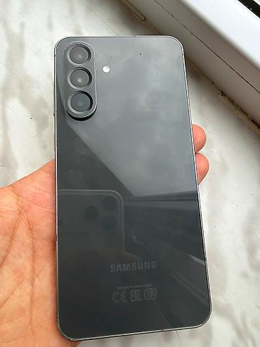 samsung a56 irsad: Samsung Galaxy A56 5G, 128 GB, rəng - Qara, Barmaq izi, İki sim kartlı, Face ID — 2