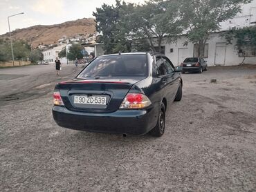 Mitsubishi: Mitsubishi Lancer: 1.3 l | 2006 il 300000 km — 11