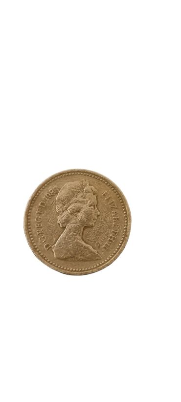 редкие старые монеты: Королева Великобритании Елизавета II one paund 1983 г. – «DECUS ET