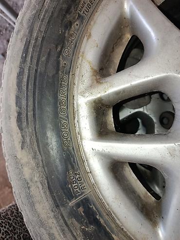 4 7: Комплект автомобильных колес с шинами 205/65 R15 94Q. Состав: - 4 — 1