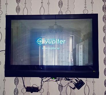 wifi adapteri: LG divar tipli televizor + Yupiter TV qutusu (IP/OTT set-top box) — 3