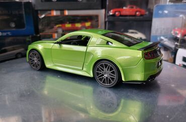 Avtomobil modelləri: Коллекционная модель Ford Mustang Street Racer Green black 2014 — 6