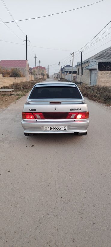 VAZ (LADA): Avtomobil: Lada Samara (VAZ 2114/2115 seriyası – ön görünüş və loqo — 15