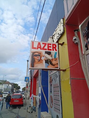 Paltar tikişi: Lazer reklami iwiqlidi 2 lampalidi cox guclu yanir tezedi problemsizdi