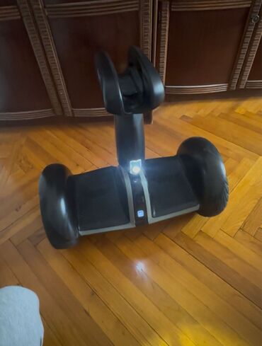 qaçış aparatı 2ci el: Elektrikli hoverboard/gyroskuter – dizüstü sükanlı model - Rəng: qara at lalafo.az qaçış aparatı 2ci el: Elektrikli hoverboard/gyroskuter – dizüstü sükanlı model - Rəng: qara