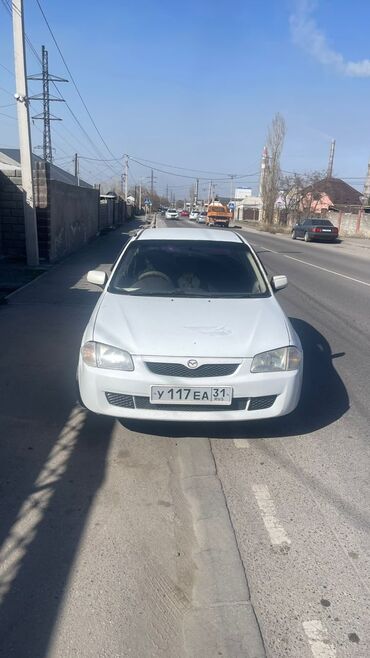 автомобили автомат: Mazda Familia: 1999 г., 1.5 л, Автомат, Бензин, Седан