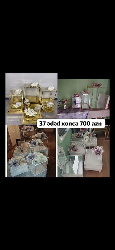 37 ədəd xonca – 700 AZN Paket tərkibi: - Şəffaf şüşəli və metal