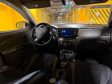 avtomobil az zil 130: Kia Rio: 1.4 л | 2010 г. Седан — 5