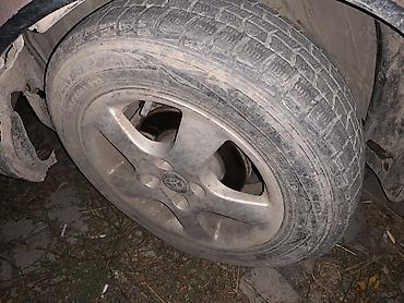 Унаа: Toyota Duet: 2000 г., 1 л, Автомат, Бензин, Лифтбек — 7
