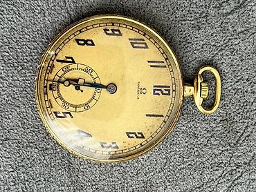omega: Omega cib saatı – mexaniki, qurmalı - Brend və model: Omega (lövhədə — 4