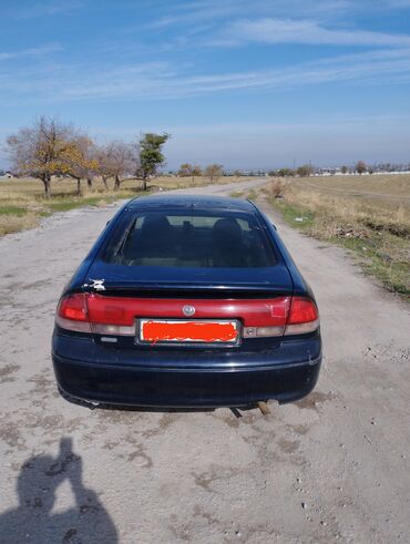 Mazda: Продаю машину мазда кронос. 1993 года выпуска. хечбек. обьем 1.8