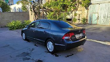 Honda: Honda Civic: 1.3 l | 2006 il Sedan — 1