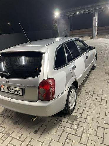 мини электро: Mazda 323: 2003 г., 1.3 л, Механика, Бензин, Хэтчбэк — 4
