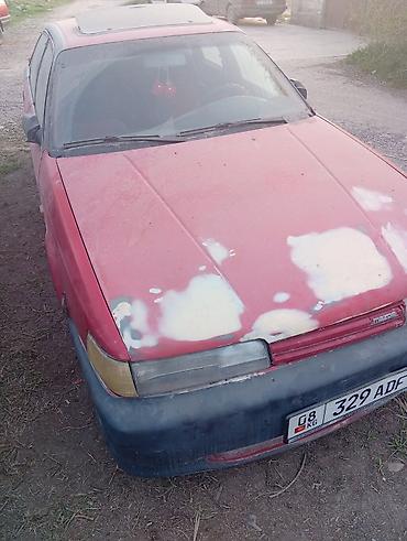 210 4.3: Mazda 626: 1991 г., Седан — 5