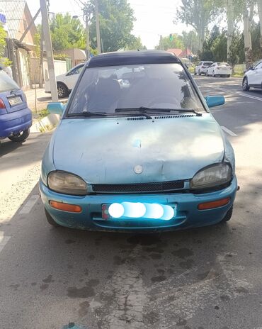 ваздушный сигнал: Mazda 121: 1992 г., 1.3 л, Механика, Бензин