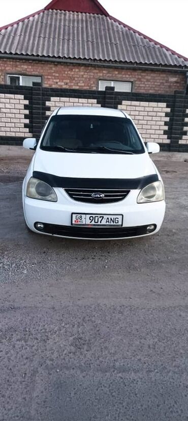 купить бокс на крышу автомобиля бу: Kia Carens (белый минивэн, 7 мест) Основные особенности: - Кузов