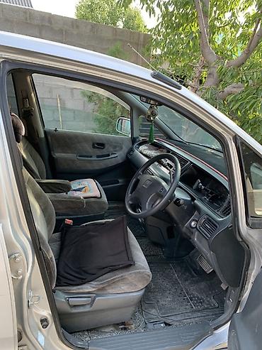 mini v: Honda Odyssey: 1997 г., Минивэн — 3
