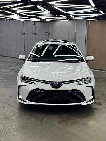 voxy noah: Toyota Corolla: 2022 г., 1.8 л, Автомат, Гибрид, Седан — 1
