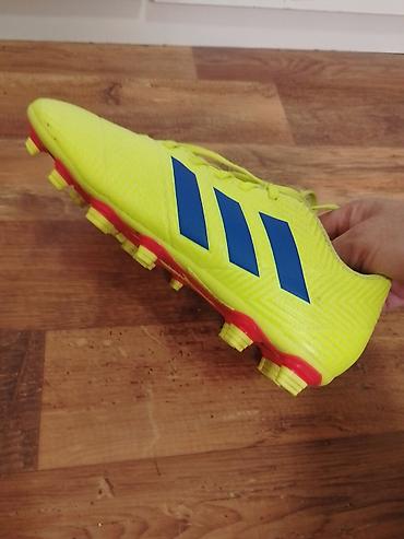 Kopačke: Fudbalske kopačke Adidas (model linije Nemeziz) za prirodnu travu - — 4