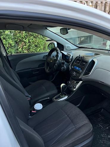 пассо: Chevrolet Aveo: 2015 г., 1.6 л, Автомат, Бензин, Седан — 6