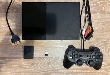 Видеоигры и приставки: Sony Plastation 2 Slim работает исправночитает лицензионные