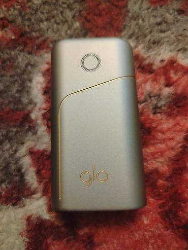 iqos 3 duos: Glo tütün qızdırma cihazı Yaxşı vəziyyətdədi adapteridə var. Real — 1