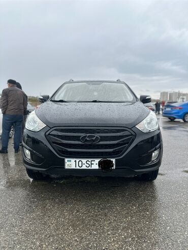 Кольца: Hyundai Tuscani: 2 л | 2010 г. Кроссовер