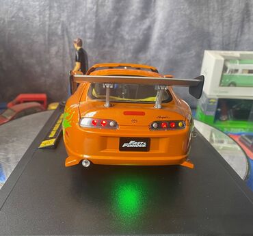 Avtomobil modelləri: Коллекционная модель Toyota Supra A80 Orange 1995 Jada Toys Art — 20