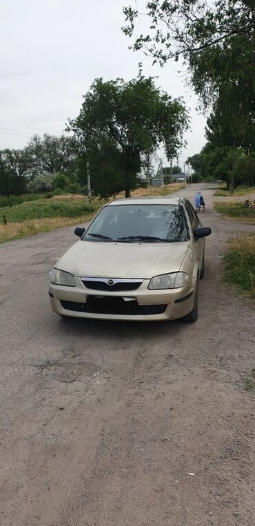 Mazda: Mazda 323: 2000 г., Механика, Бензин, Седан — 1
