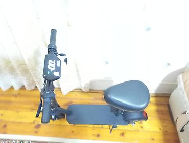 scooter şarjlı: Elektrik skuter – oturacaqlı model Xüsusiyyətlər: - Rəqəmsal LCD — 2