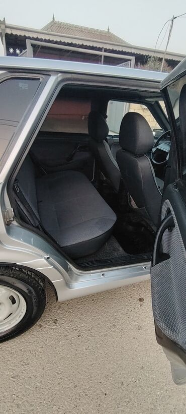 VAZ (LADA): Avtomobil: Lada Samara (VAZ 2114/2115 seriyası – ön görünüş və loqo — 11