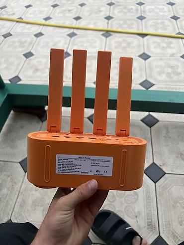 компь: 4G LTE роутер WN830C (оранжевый) - Тип: мобильный 4G LTE роутер с — 1
