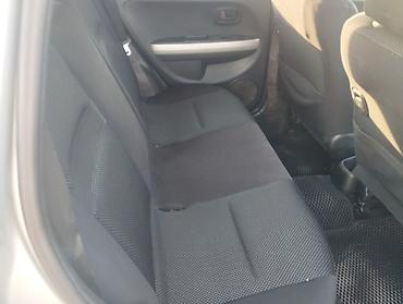 сут машине: Toyota Ist: 2003 г., 1.3 л, Автомат, Бензин, Хетчбек — 5