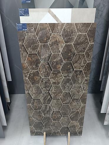 ev divar daslari: Kermoqranitlər. Kafel. Metlax.60x120 ölçüdə. Modellər çoxdur. Məhsul — 4
