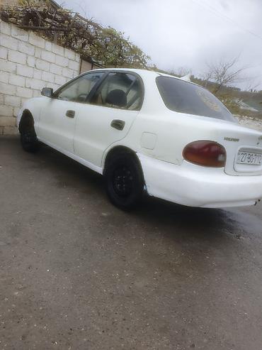 tap az kondisioner: Hyundai Accent: 1.5 l | 1995 il Sedan — 8