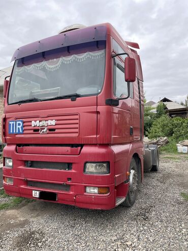 man грузовики: Тягач, MAN, 2002 г., Тентованный