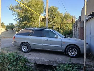 сузуки вогон р: Mazda Capella: 2002 г., 2 л, Механика, Бензин, Универсал — 8