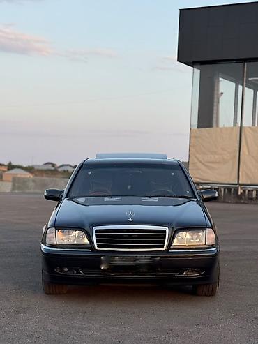 cls 63 amg: Mercedes-Benz C-Class: 2.4 l | 1998 il Sedan — 2