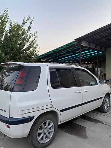 такта раум: Toyota Raum: 1998 г., Универсал — 2