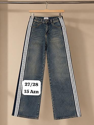 Cinslər: Geniş kəsimli qadın cins şalvar. - Rəng: klassik mavi denim - — 1