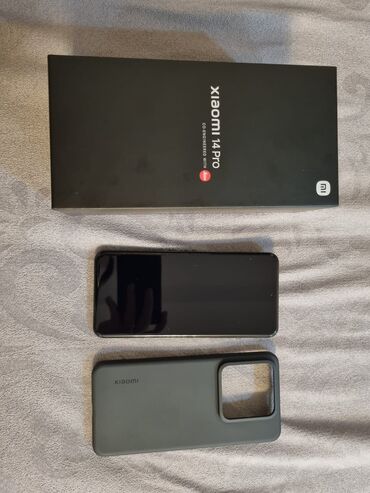 xiaomi poco f3 qiymeti: Xiaomi 14 Pro, 1 ТБ, цвет - Черный, 
 Отпечаток пальца, Две SIM карты, Face ID