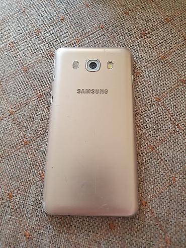 iphon 11pro: Смартфон Samsung Galaxy (серия J, золотой цвет). Основные — 2