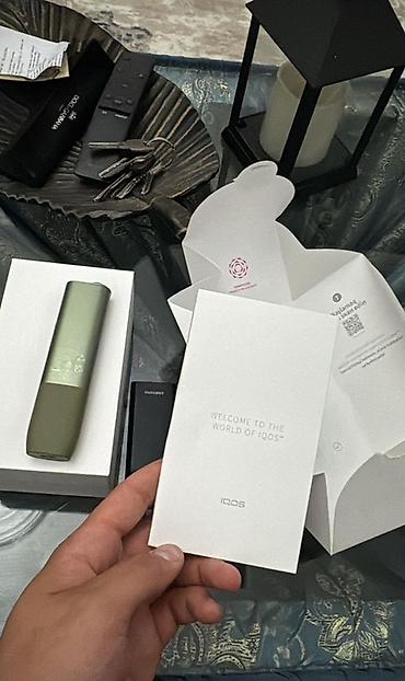 IQOS cihazı – Heat‑Not‑Burn tütün sistemi Məhsulun xüsusiyyətləri: -