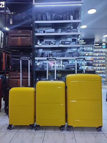 Sərnişin çemodan dəsti – 3 ölçü, parlaq sarı rəng - Material: sərt və at lalafo.az Sərnişin çemodan dəsti – 3 ölçü, parlaq sarı rəng - Material: sərt və