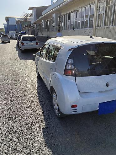 опел каропка: Toyota WiLL: 2002 г., Автомат, Бензин, Хэтчбэк — 6