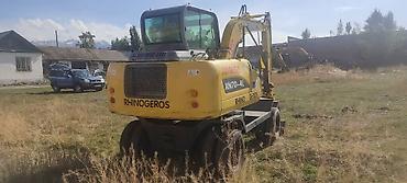 Экскаваторы: Экскаватор, 2013 г., Колесный — 5