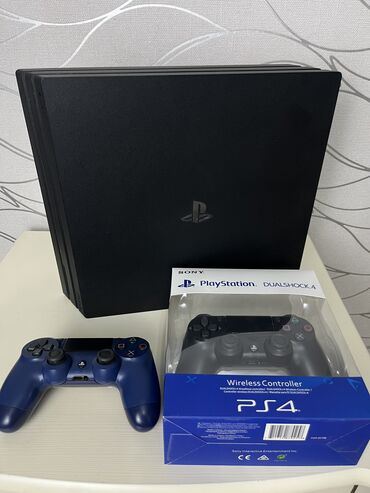 PS4 (Sony PlayStation 4): Продаю PlayStation 4 Pro (1 ТБ) с 50 играми и 2 геймпадами