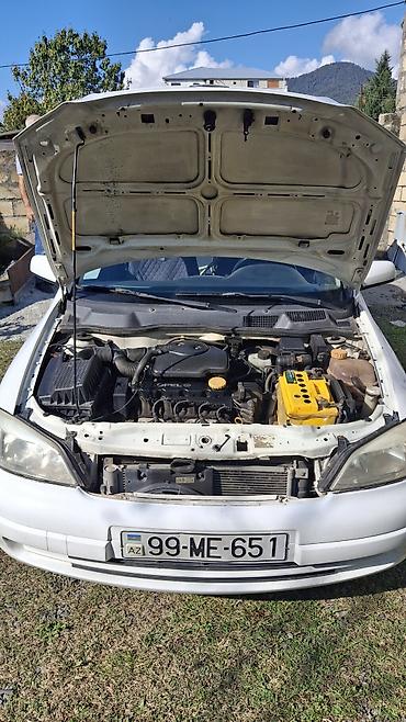avtomobil kreditlə: Opel Astra Caravan (Universal) – ağ rəngdə, 5 qapı Mühərrik və — 8