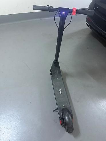 elektrikli scooter toba: Elektrikli skuter – Toba - Rəng: qara, yığcam və minimal dizayn - — 3