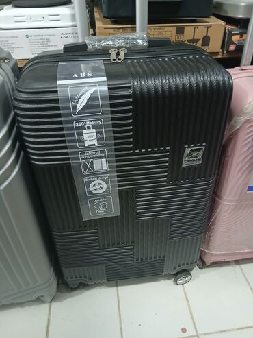 Çamadanlar: Dörd təkərli səyahət çantası, möhkəm materialdan hazırlanmışdır və — 6